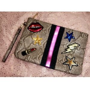 Patched Wristlet Clutch